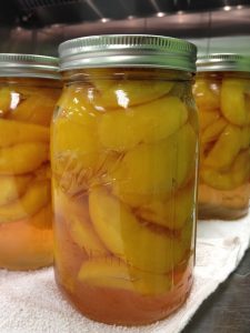 jar of peaches in light syrup